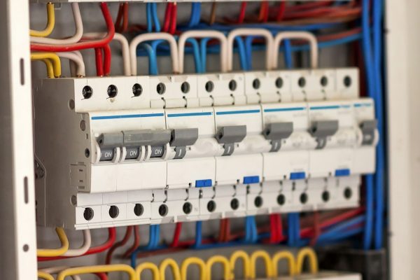 Electical distribution fuseboard. Electrical supplies. Electrical panel at a assembly line factory Electical distribution fuseboard. Electrical supplies. Electrical panel at a assembly line factory